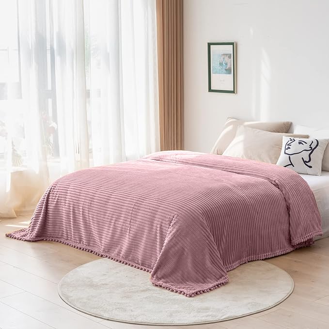 DISSA Fleece Blanket Twin Size – 60x80, Pink - Soft, Plush, Fluffy, Fuzzy, Warm, Cozy – Perfect Throw for Couch, Bed, Sofa - with Pompom Fringe - Flannel Blanket
