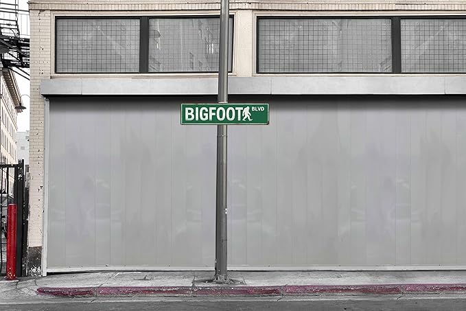 Bigfoot Blvd Metal Sign 4x16in Funny Rustic Plaque for Cabin Road Outdoor Adventure Wall Art