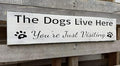 Dog Lover Gift, The Dog Lives Here Sign, Pet Owner Dogs Decor Rustic Pet Hanging Doggy Art Quote (Dogs Live here) 4x16 Inch