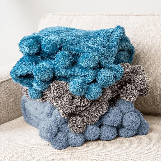 PAVILIA Blue Sherpa Throw Blanket for Couch, Warm Plush Pom Pom Blanket Throw, Dusty Blue Fuzzy Sofa Throw, Lightweight Soft Cozy Fluffy Blanket with Pom Poms, Light Blue, 50x60