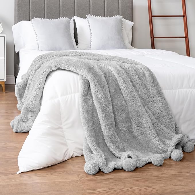 Pavilia Light Grey Sherpa Throw Blanket for Couch, Warm Plush Fuzzy Blanket Throw, Gray Sofa Throw, Lightweight Soft Cozy Fluffy Blanket with Pom Poms, Light Gray, 50x60