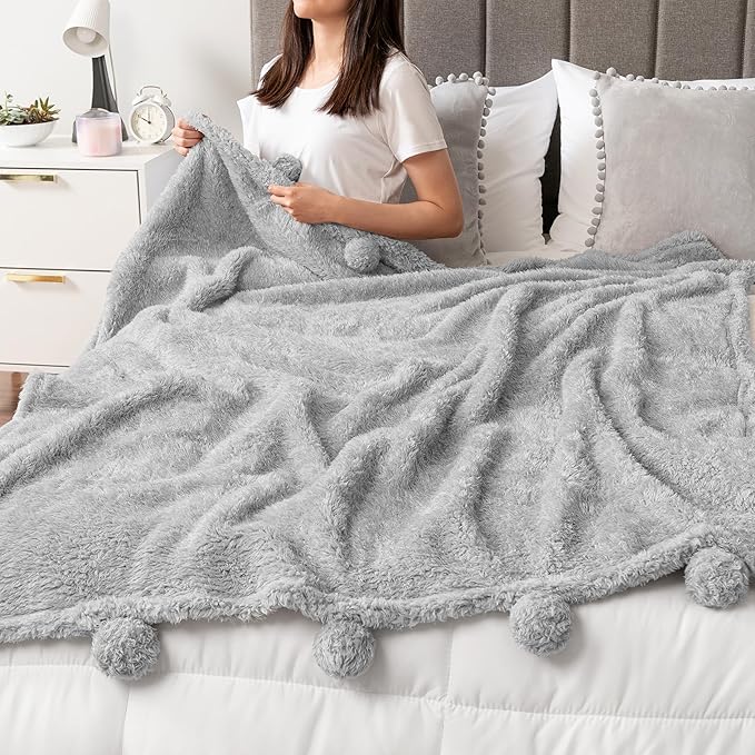 Pavilia Light Grey Sherpa Throw Blanket for Couch, Warm Plush Fuzzy Blanket Throw, Gray Sofa Throw, Lightweight Soft Cozy Fluffy Blanket with Pom Poms, Light Gray, 50x60